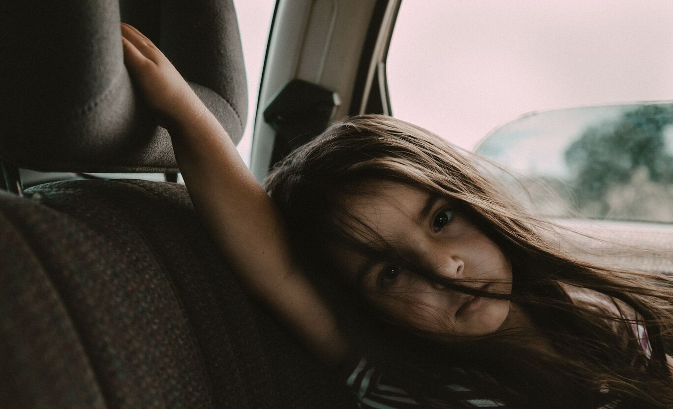 Car interior and headrest utility